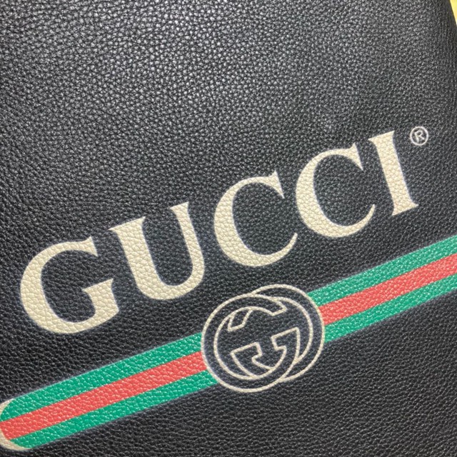 Gucci雙肩包 523586 古馳LOGO印花小號束帶背包 gucci真皮女士後背包  gqy2116